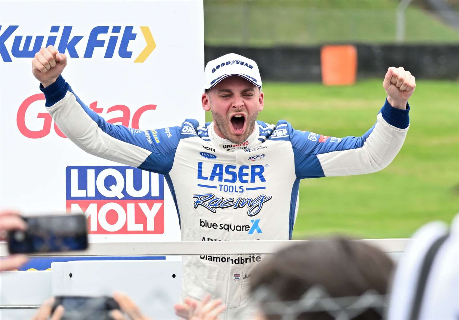 Jake Hill celebrates his maiden BTCC title - he is staying with Laser Tools Racing with MB Motorsport to defend the crown in 2025. Picture: Simon Hildrew