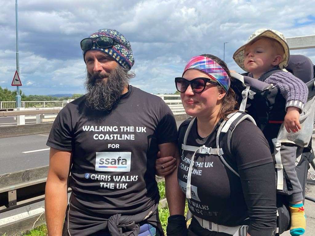 Chris Lewis, Kate Barron and their son Magnus at the Severn Bridge in Chepstow (Bronwen Weatherby/PA)