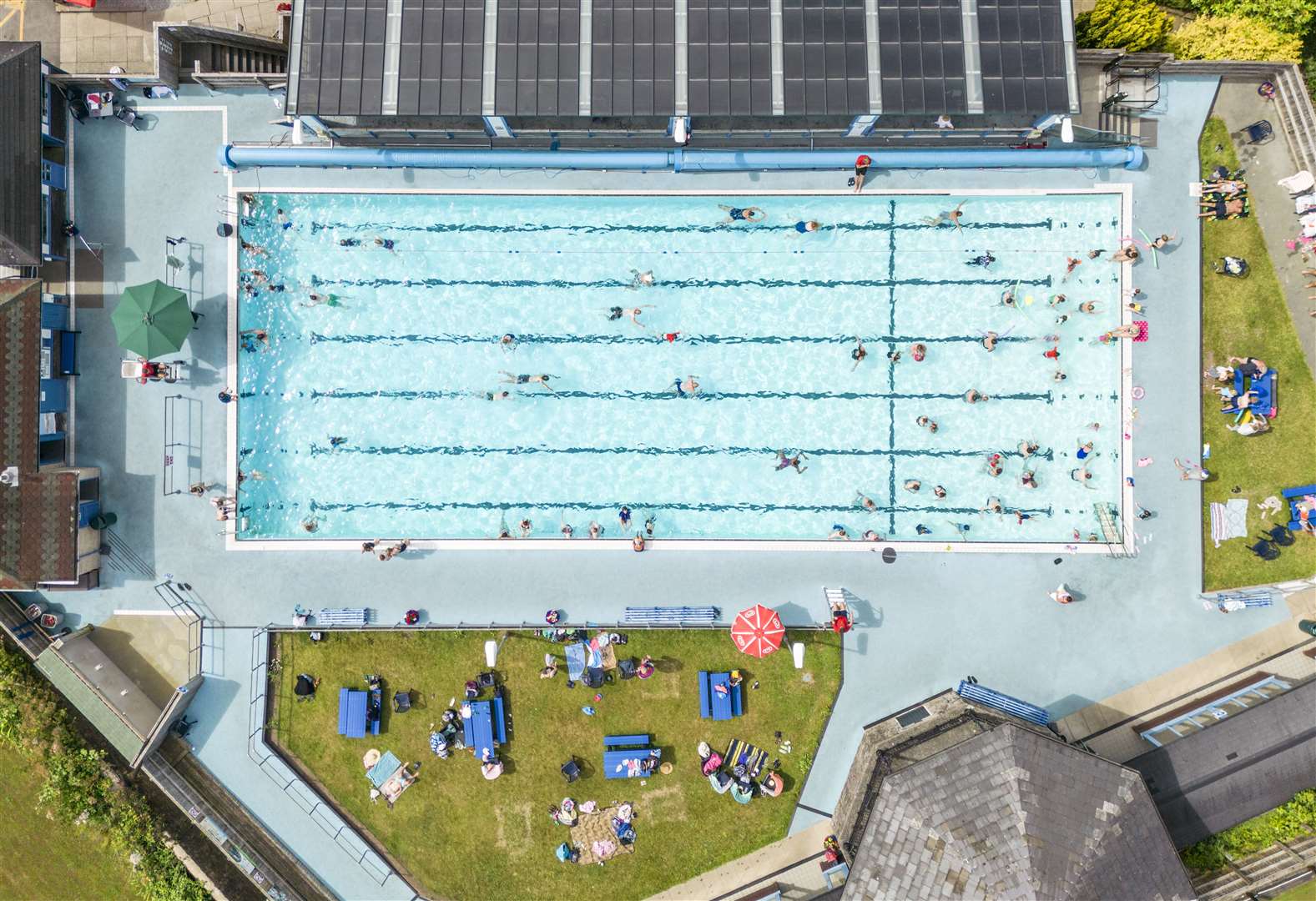 People enjoy the hot weather at Hathersage open air swimming pool at Hope Valley, near Sheffield (Danny Lawson/PA)