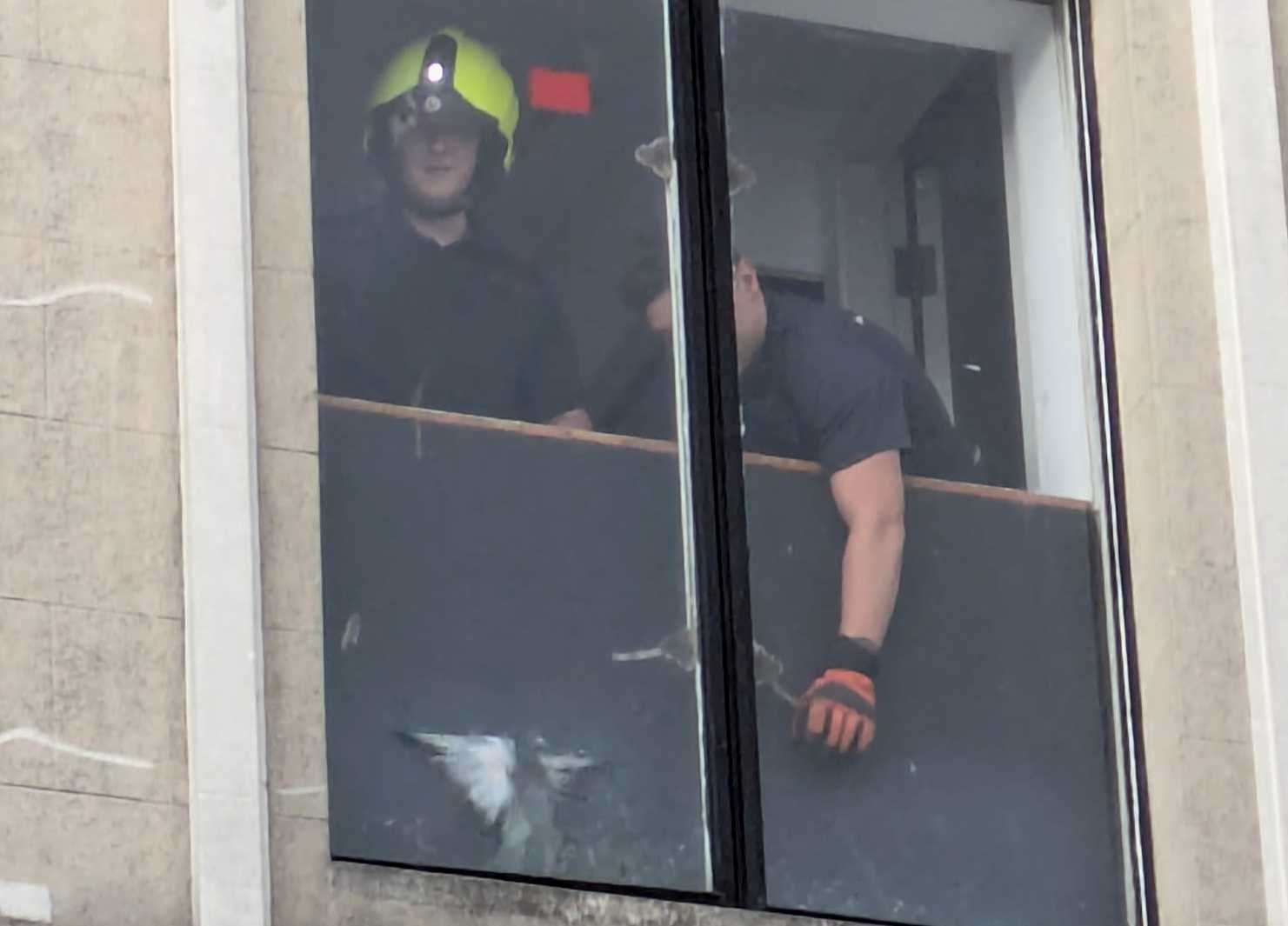 Firefighters helped rescue a trapped pigeon from the former Debenhams store in Canterbury