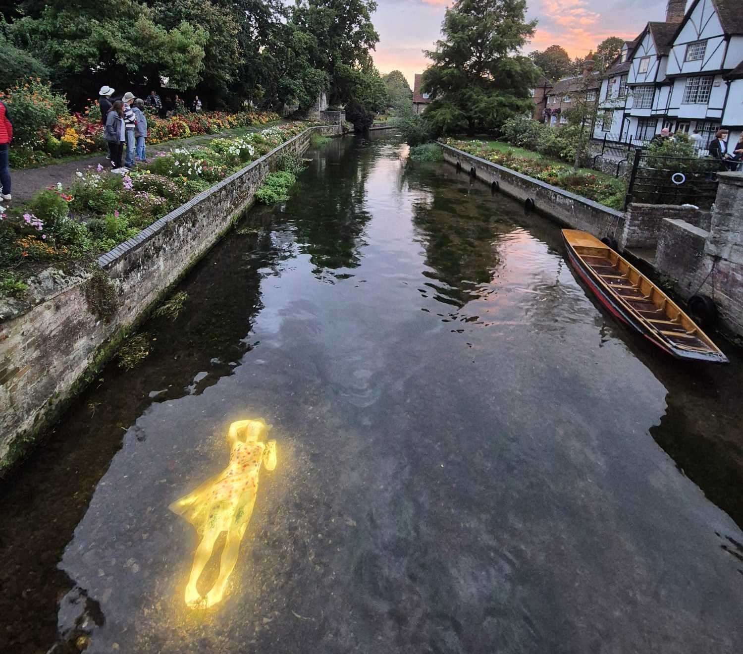 Jason deCaires Taylor's 'Alluvia' illuminated in the river Stour in Canterbury