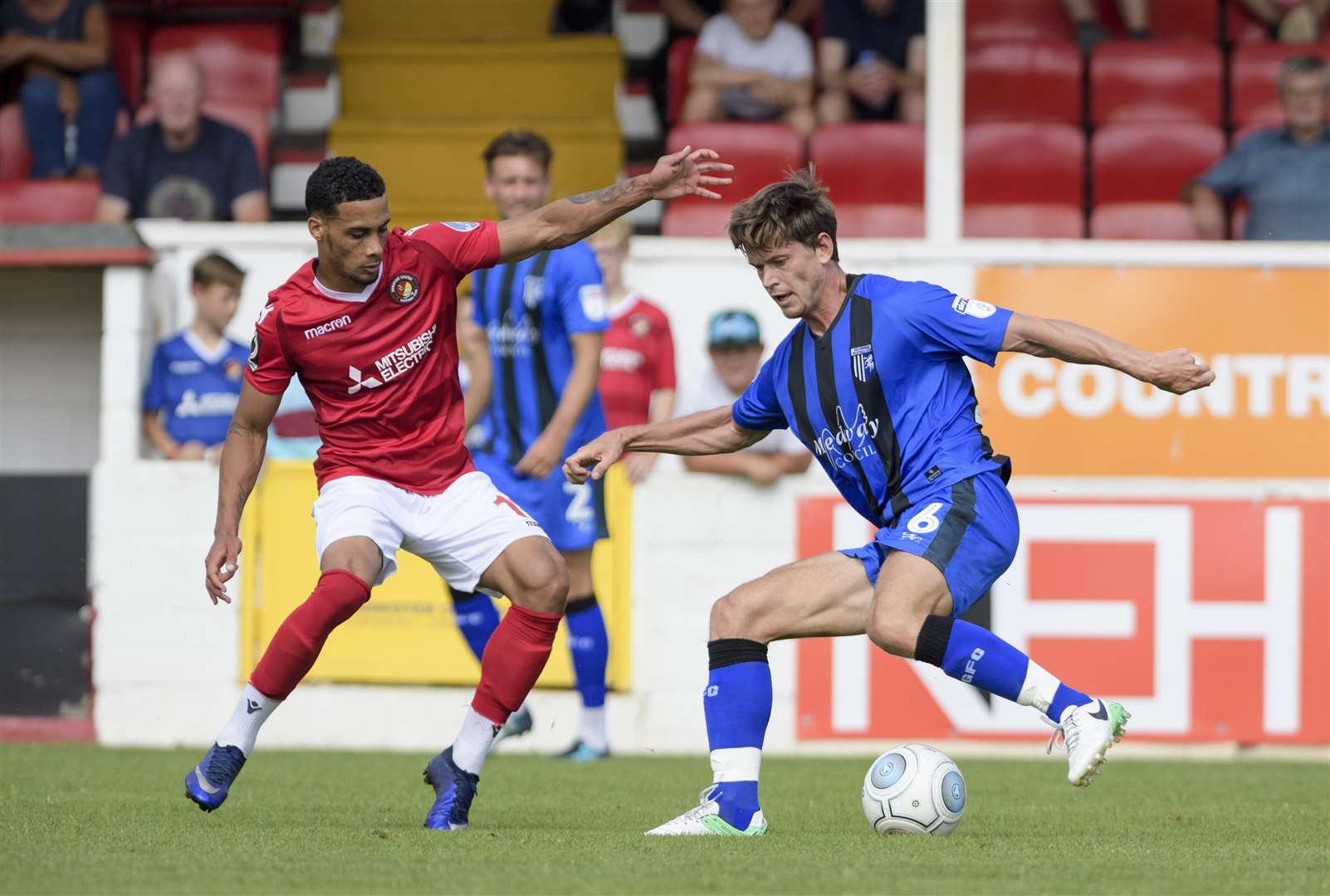 Billy Bingham looks to turn away from Corey Whitely Picture: Andy Payton