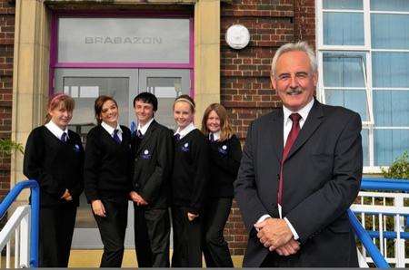 Pupils from the Brabazon Family Unit, outside their new reception, with the executive head, Alan Klee