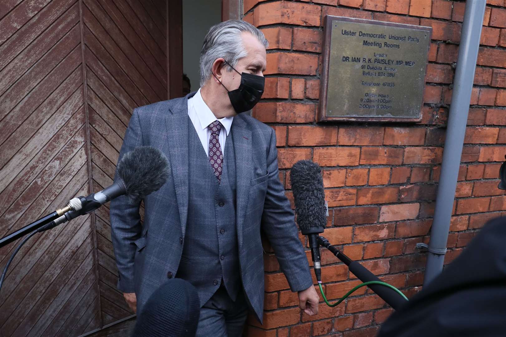 Edwin Poots leaves the DUP headquarters in Belfast after deciding to quit as leader (Brian Lawless/PA)