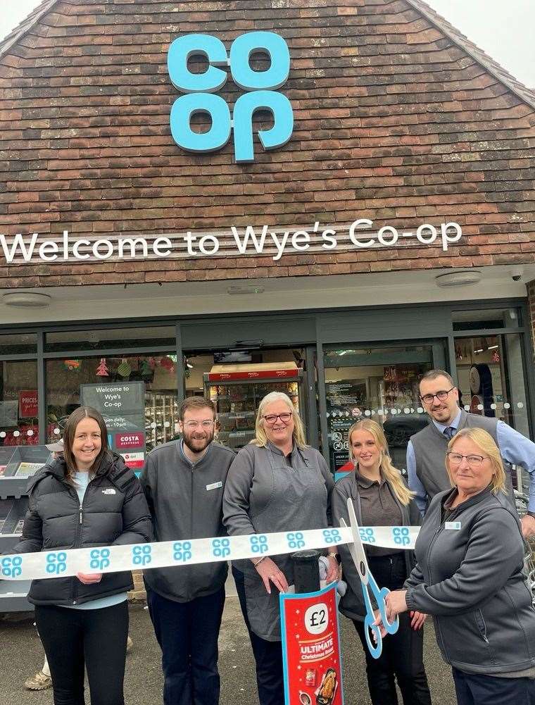 Co-op colleagues in Wye cutting the ribbon as the store relaunches. Picture: Co-op