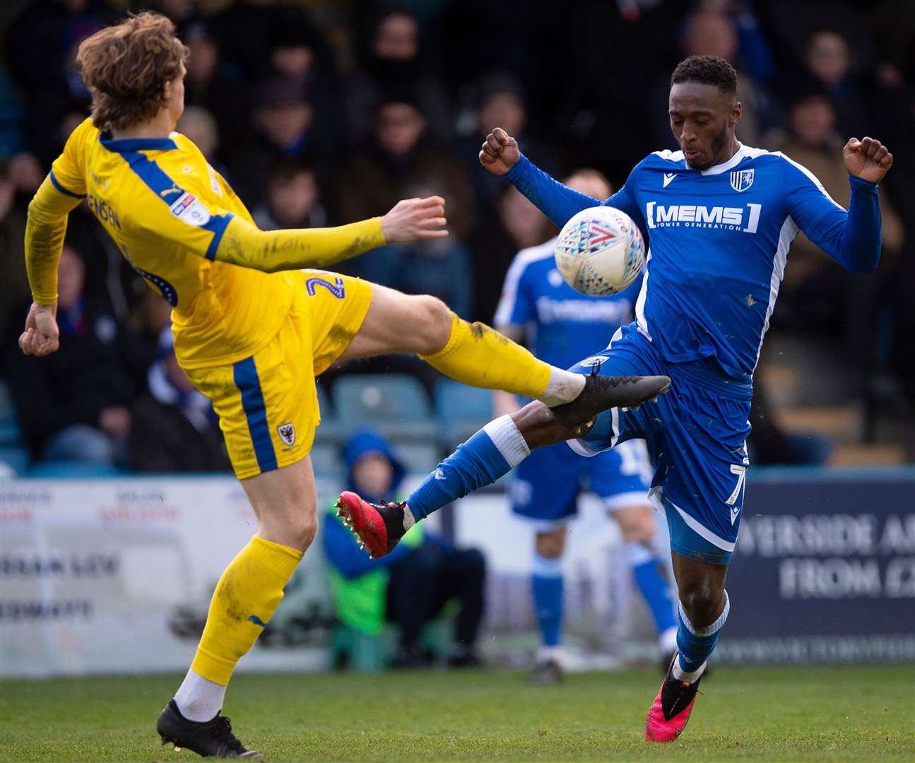 Gillingham's Brandon Hanlan challenges AFC Wimbledon's Mads Bech Sorensen. Picture: Ady Kerry