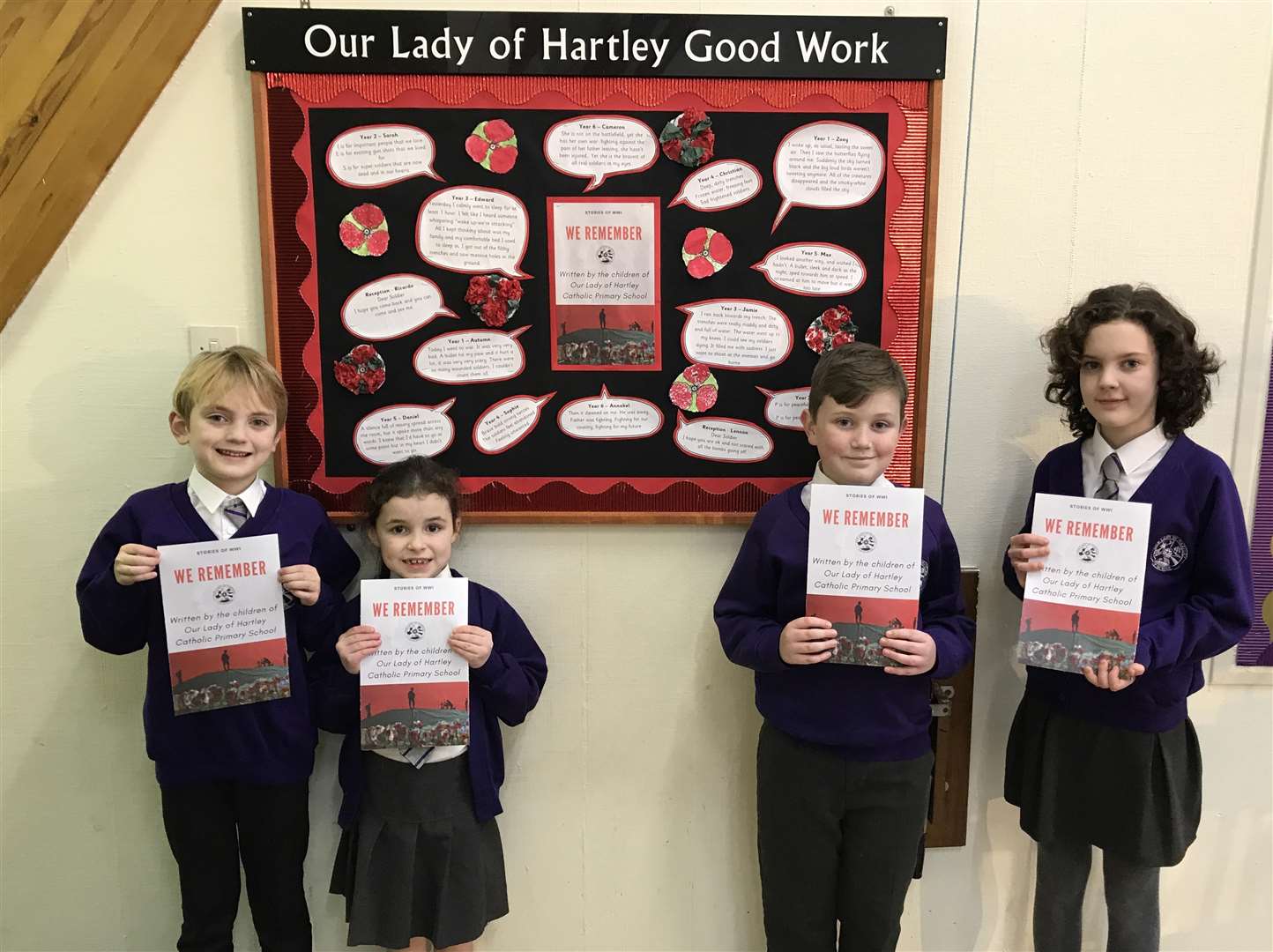 Edward, 8, Sophie, 8, Daniel, 9, and Annabel, 10 in front of their First World War display