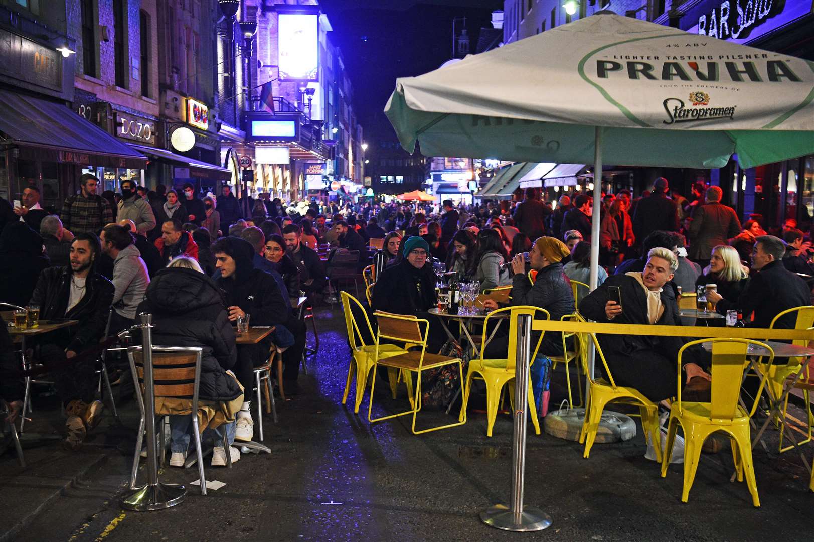 People enjoy a night out in Old Compton Street in London, ahead of a national lockdown for England from Thursday (Kirsty O’Connor/PA)