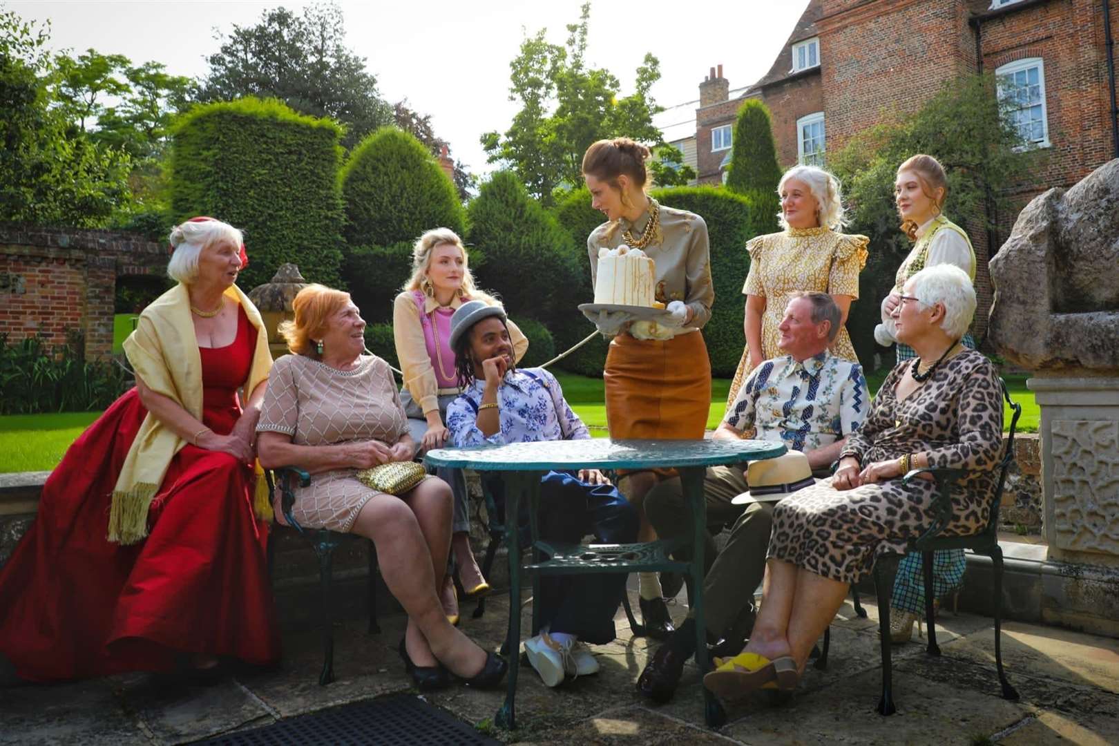 Cake time! Wonderwall photo shoot at Restoration House, Rochester, for the Wisdom Hospice. Picture: Lisa Kennedy