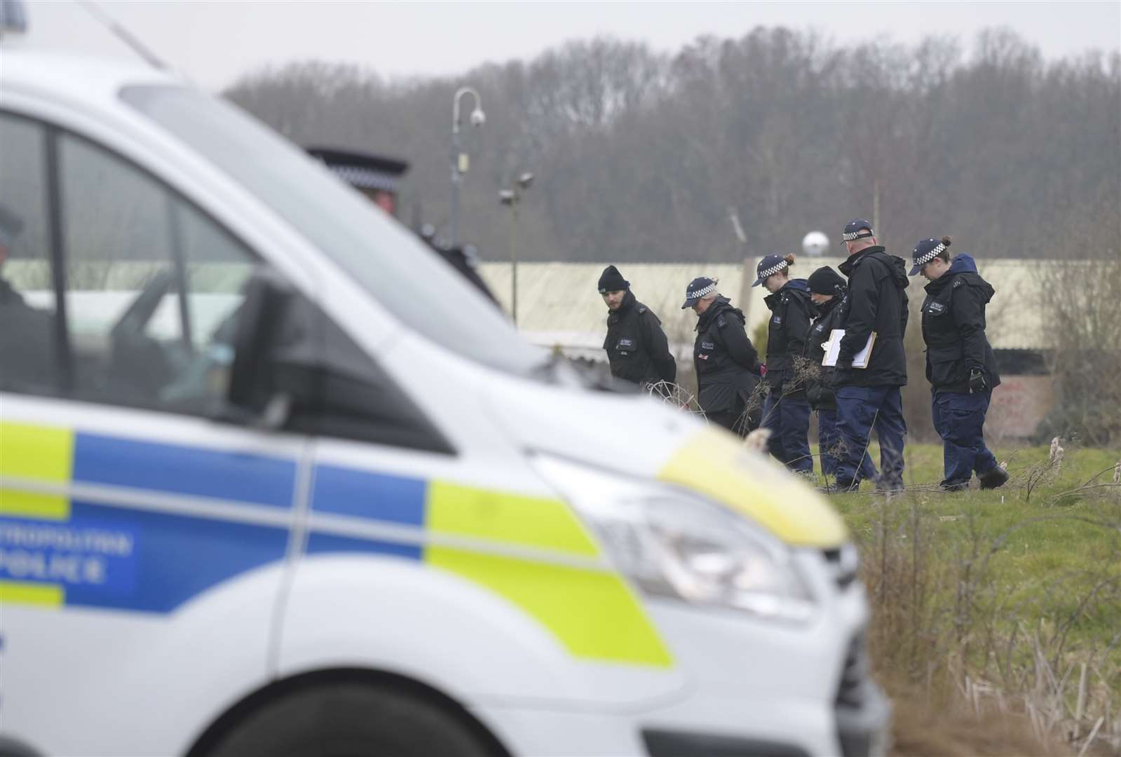 Police searching the grounds on Wednesday morning. Picture: Barry Goodwin