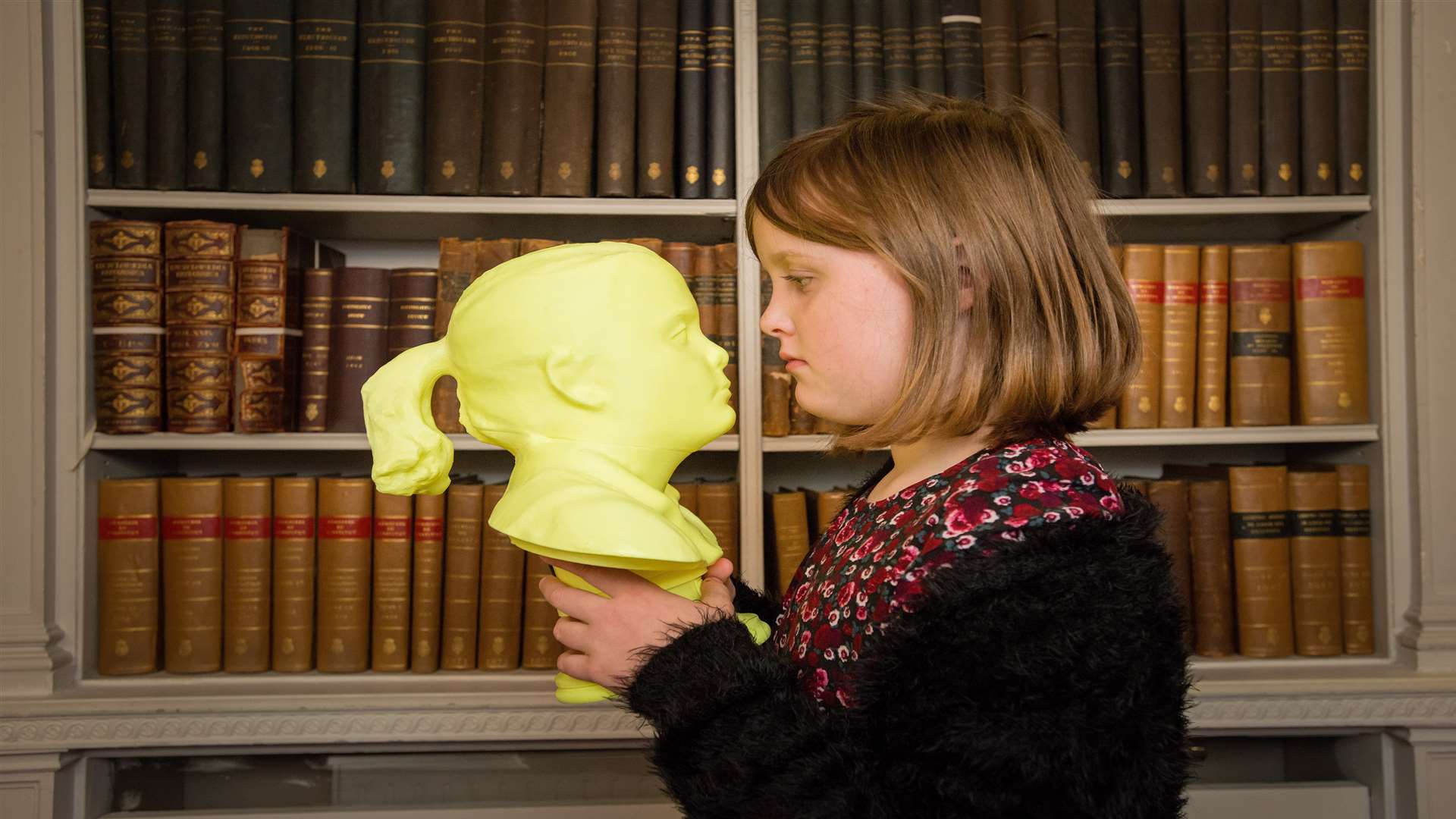 Isla with the 3D printed image of herself. Picture: Keith Millar.