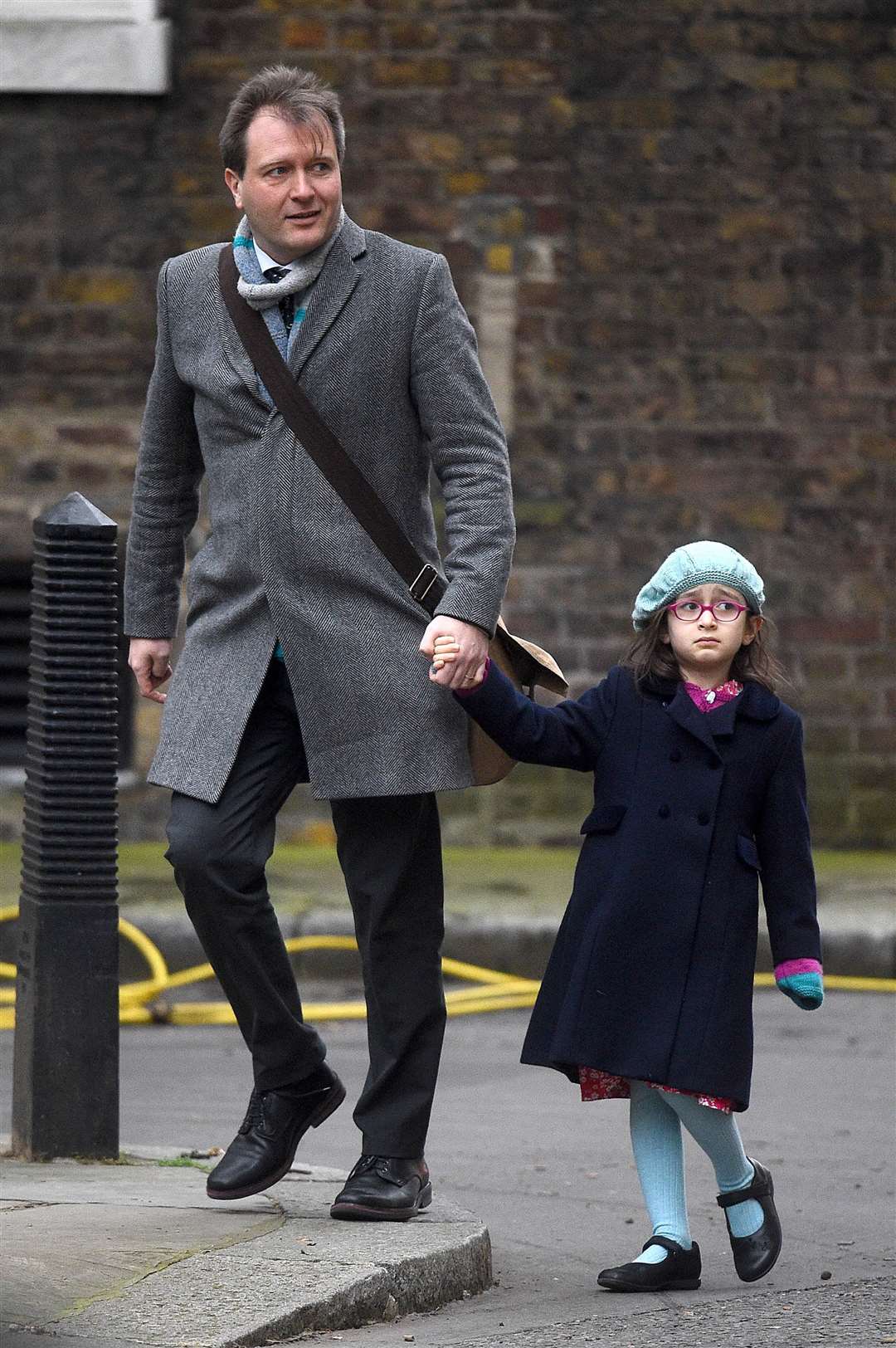 Richard Ratcliffe, the husband of Nazanin Zaghari-Ratcliffe, with their daughter Gabriella (PA)