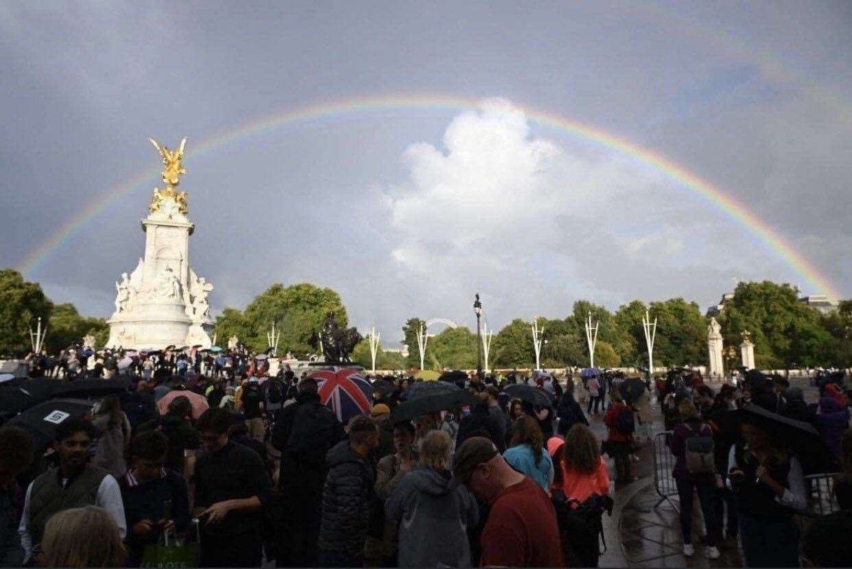 A poignant scene at Buckingham Palace earlier today after the news of the Queen's death broke. Picture: Dessydee Maseko