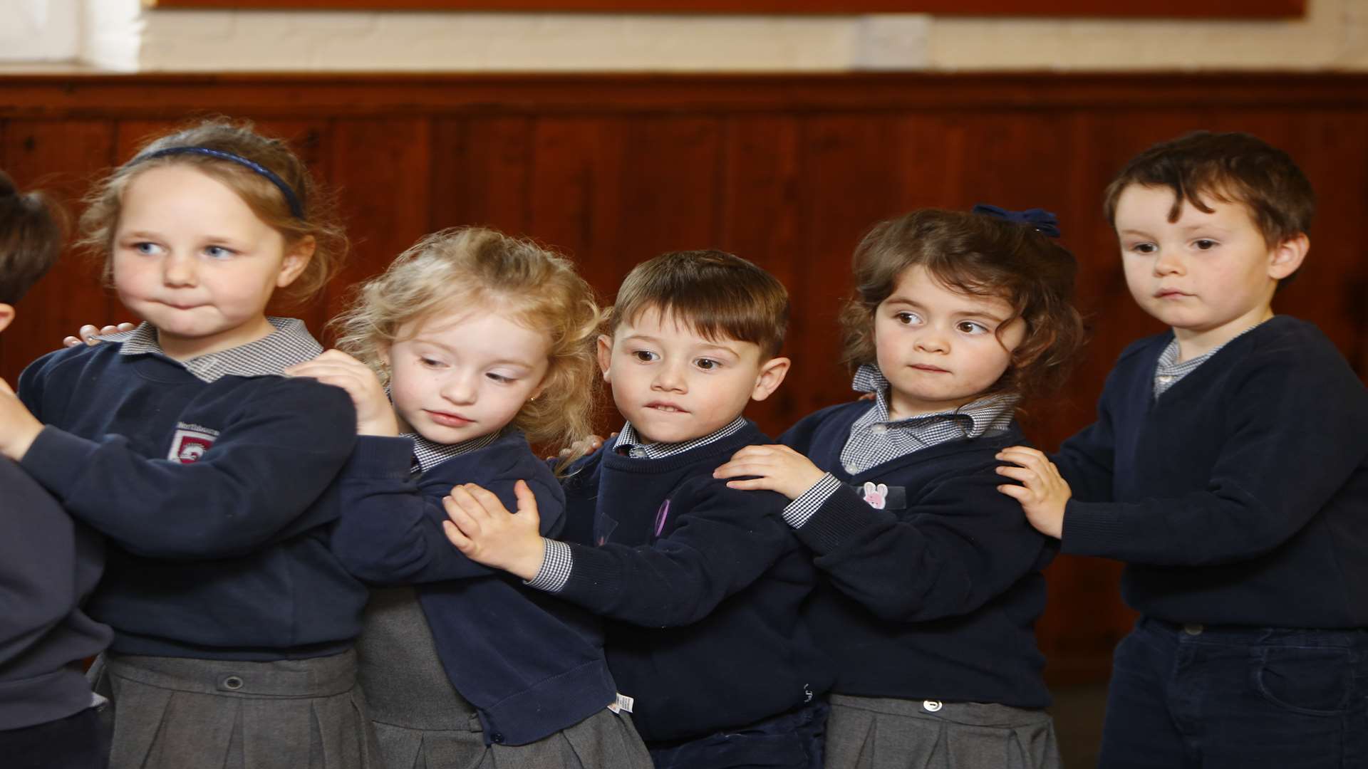 Children make a human Millipede