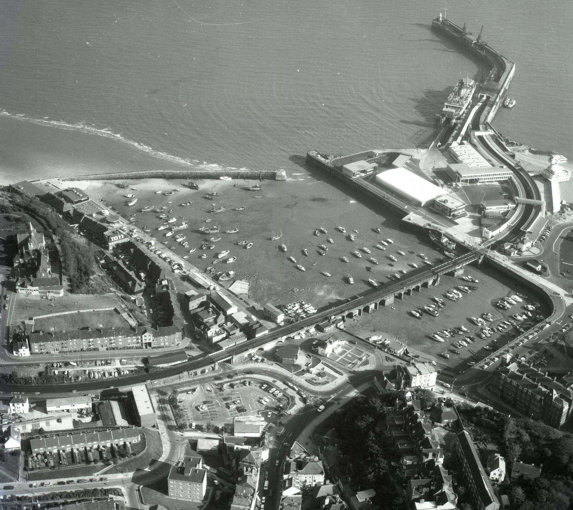 A bird's eye view of Folkestone harbour and its arm in the 1950s. Picture: Dover Strait Shipping - FotoFlite