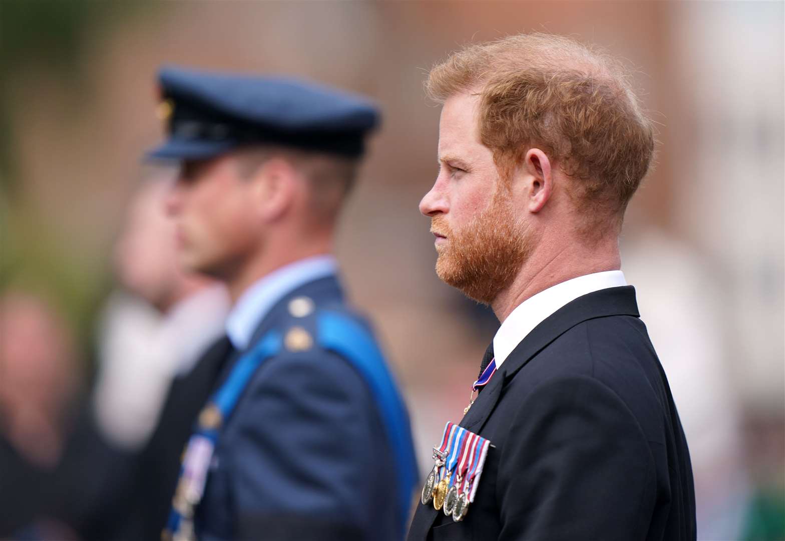 The Prince of Wales and the Duke of Sussex, in the Ceremonial Procession following the Queen’s State Funeral at Westminster Abbey last year (Tim Goode/PA)