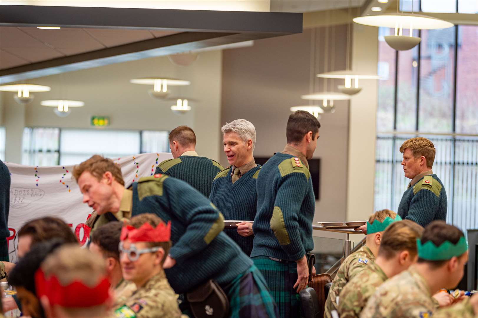 Officers serve soldiers their Christmas lunch during ‘silly week’ – an annual tradition in the Royal Regiment of Scotland (4Scots/Grayling/PA)