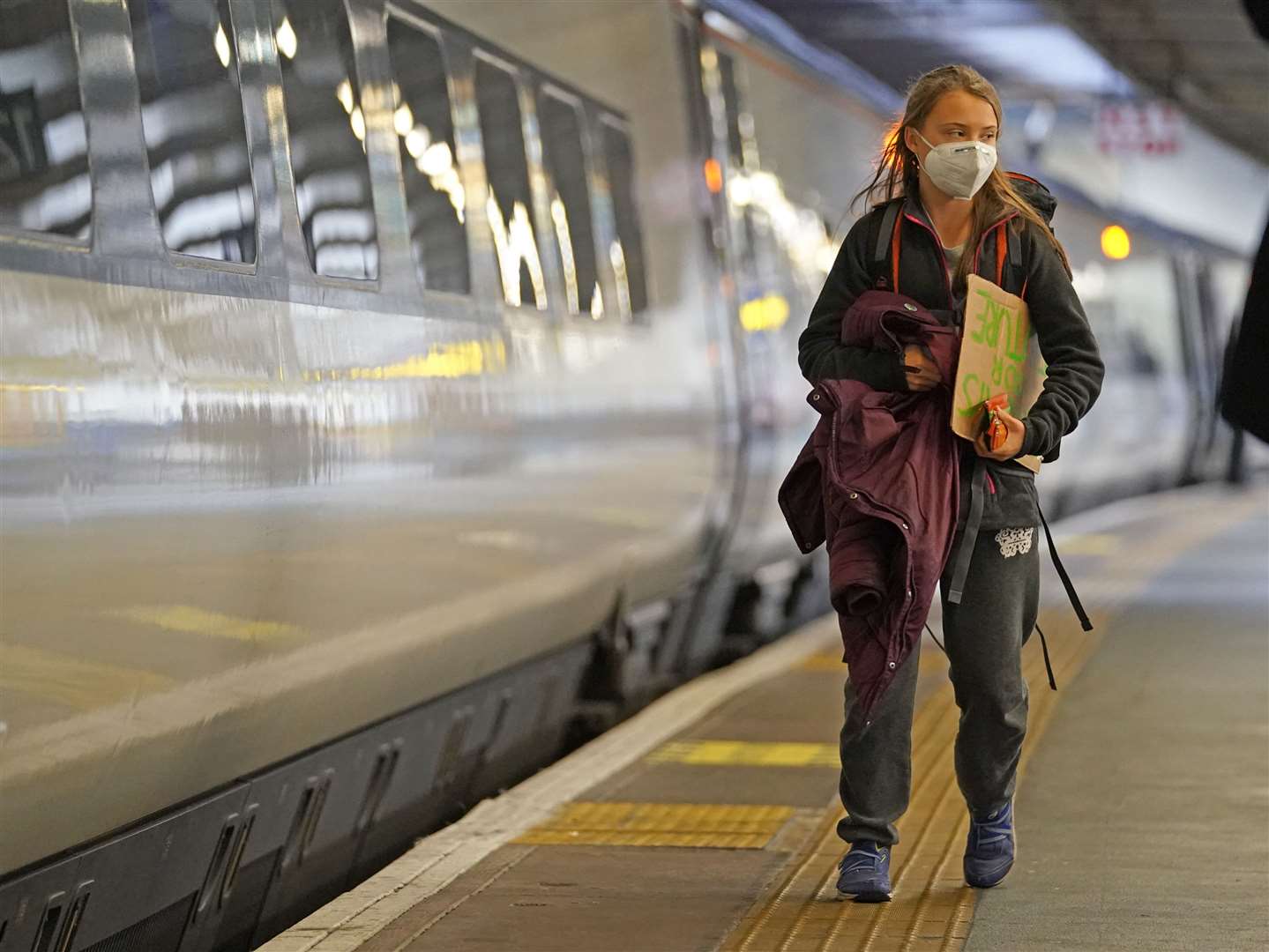 Greta Thunberg at Euston Station in London ahead of boarding a train to Glasgow where the Cop26 summit is taking place from Monday (Kirsty O’Connor/PA)