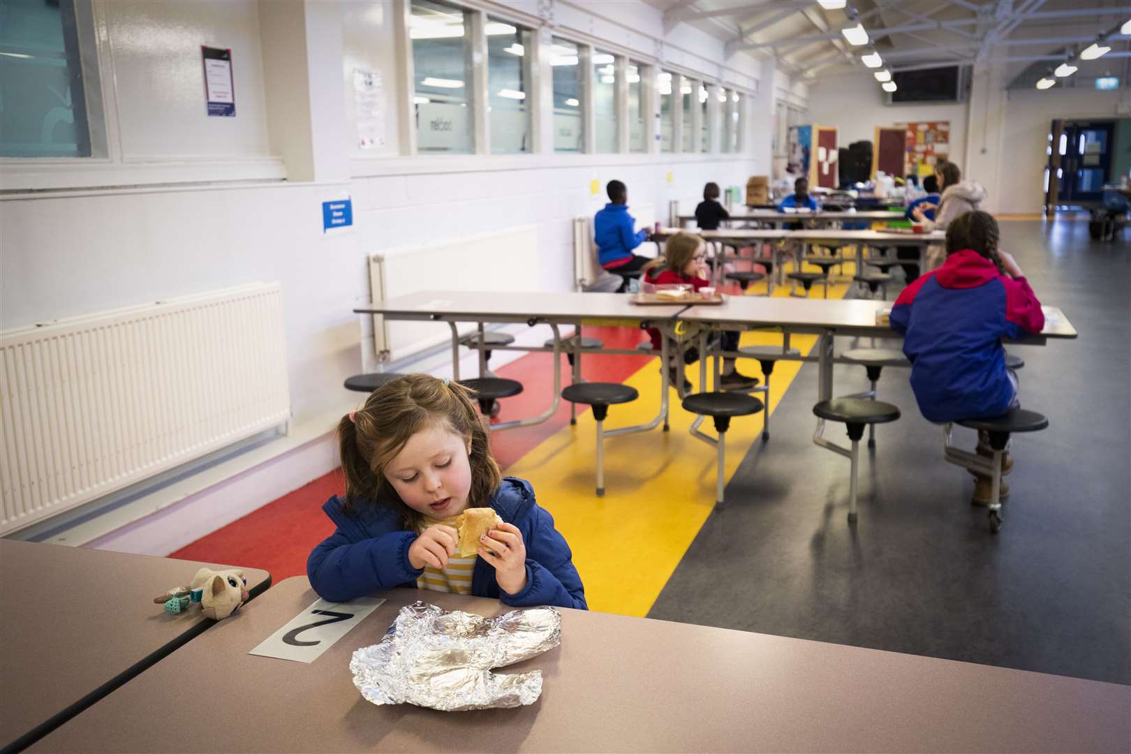 Children of key workers comply with social distancing rules while attending a hub school in Edinburgh (Jane Barlow/PA)