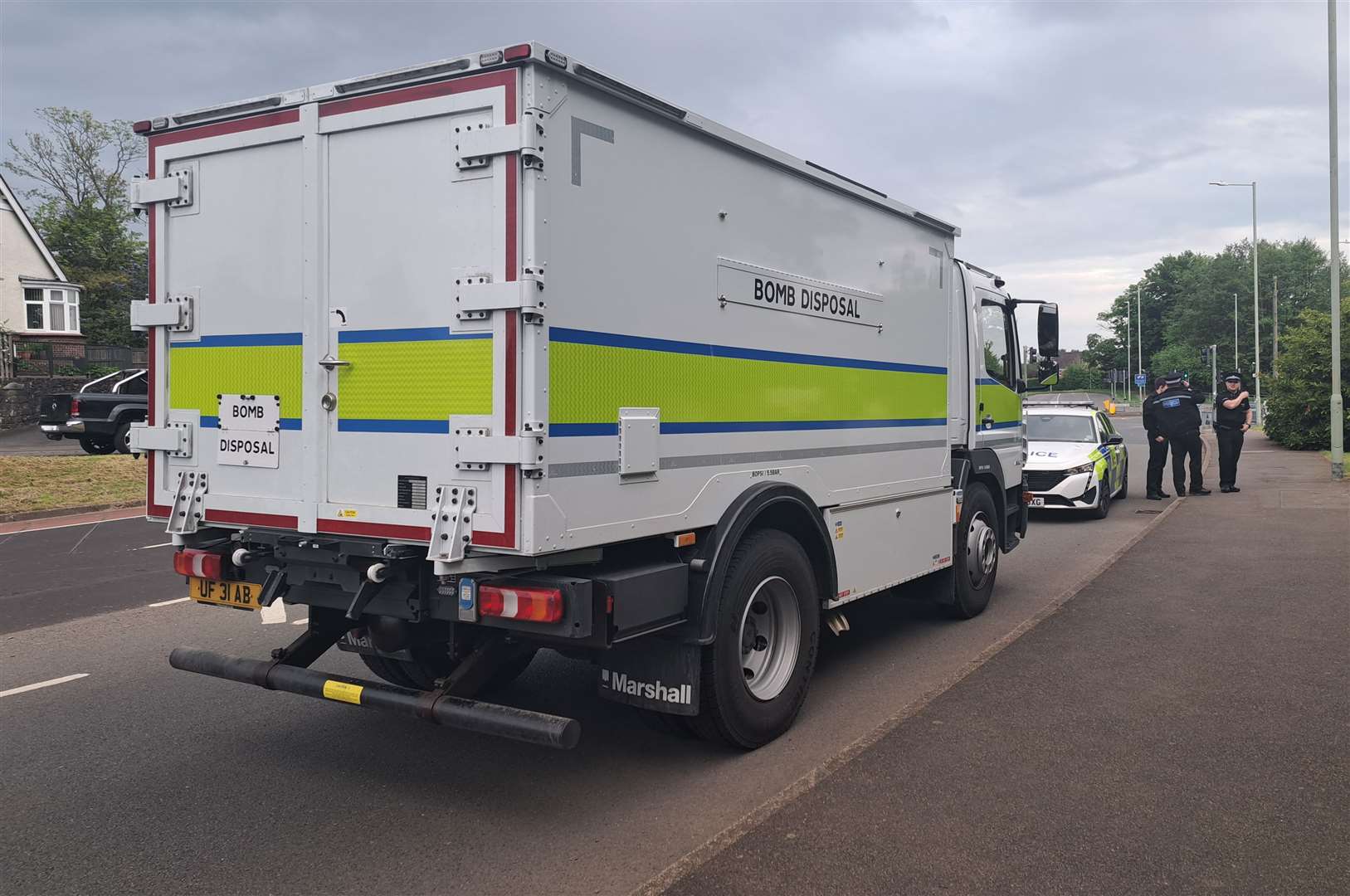 Police next to the bomb disposal team in Canterbury Road