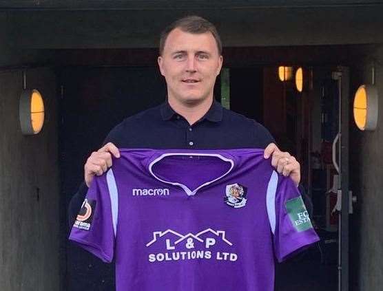 Alex Flisher poses with Dartford's away shirt