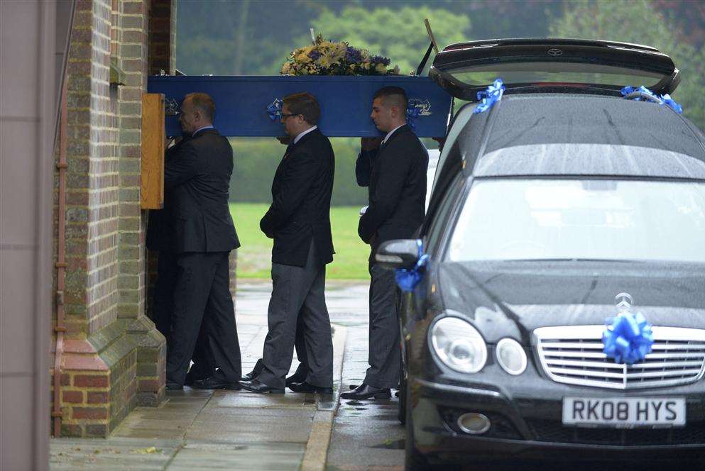 Becky's blue coffin is carried into the chapel