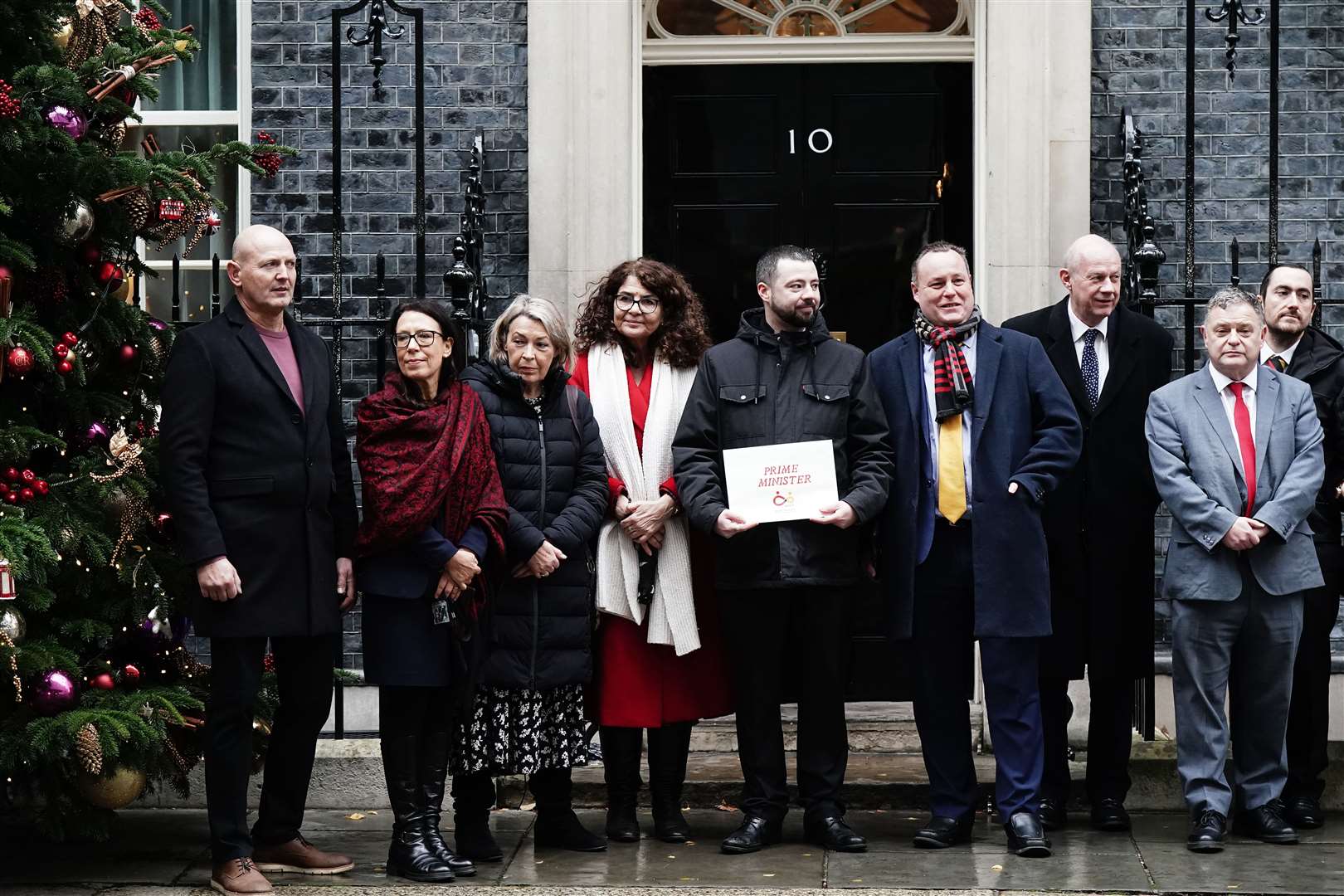 Campaigners handed in a letter calling for the government to speed up compensation for victims of the infected blood scandal in December last year (Aaron Chown/PA)