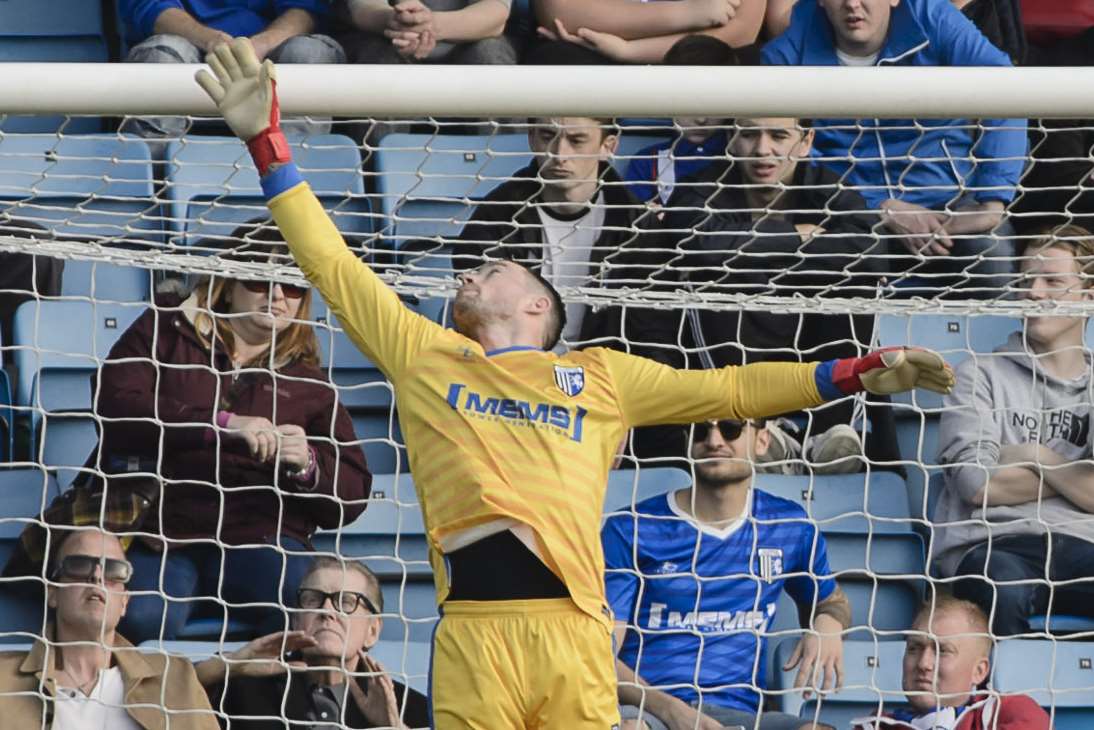 Stuart Nelson has a free-kick covered Picture: Andy Payton