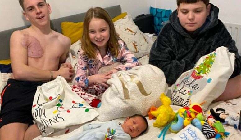 From left to right, Kelly's children: Preston, 17, Rhea, 7, Brendan 15, with baby Te-Jay at the front. Picture: Kelly Heather