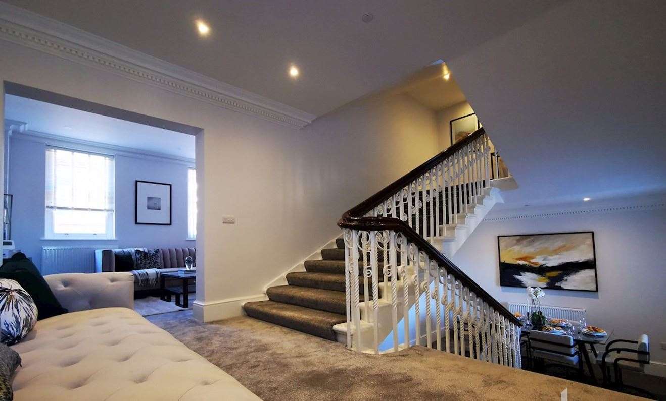 The split levels on the apartment centred around the main staircase offer additional space and spread the property across multiple floors. Picture: Haart Medway