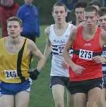 LEFT TO RIGHT: Andy Welch, D. Bradley and Tom Collins battle it out in the men's U20 race. Picture: MARK HOOKWAY