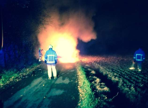 Firefighters tackling the blaze in Sun Lane.