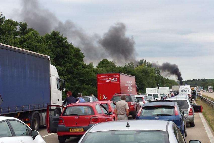 Smoke is clearly seen above the queues on the M20. Picture: @emsalmon
