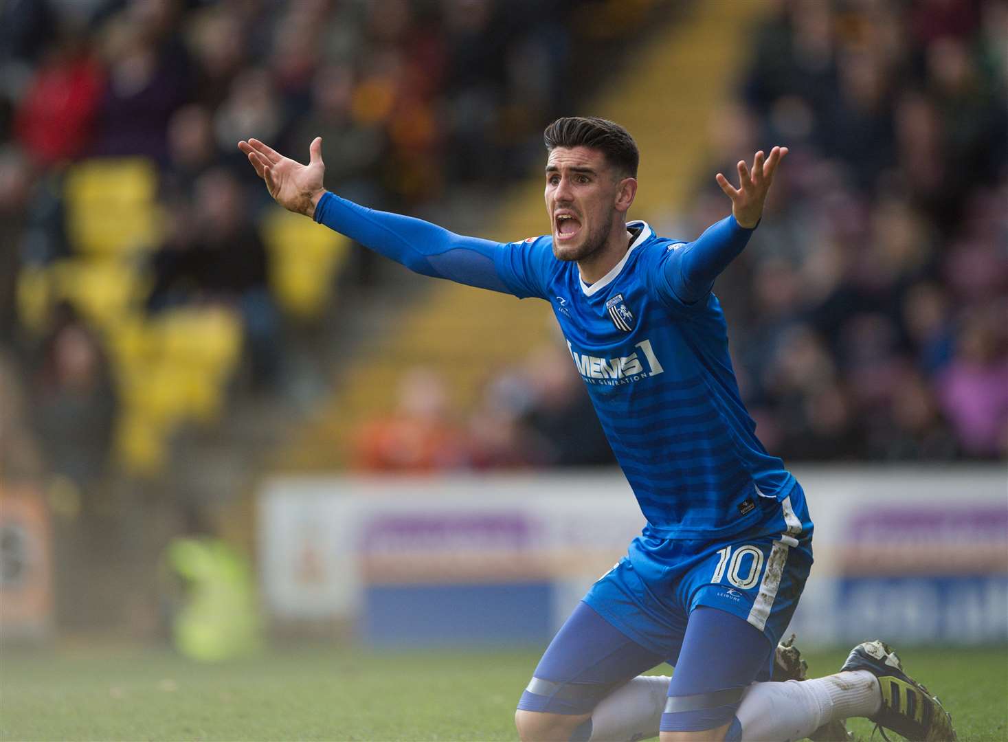 Gillingham's Conor Wilkinson appeals for a penalty at Valley Parade Picture: Ady Kerry