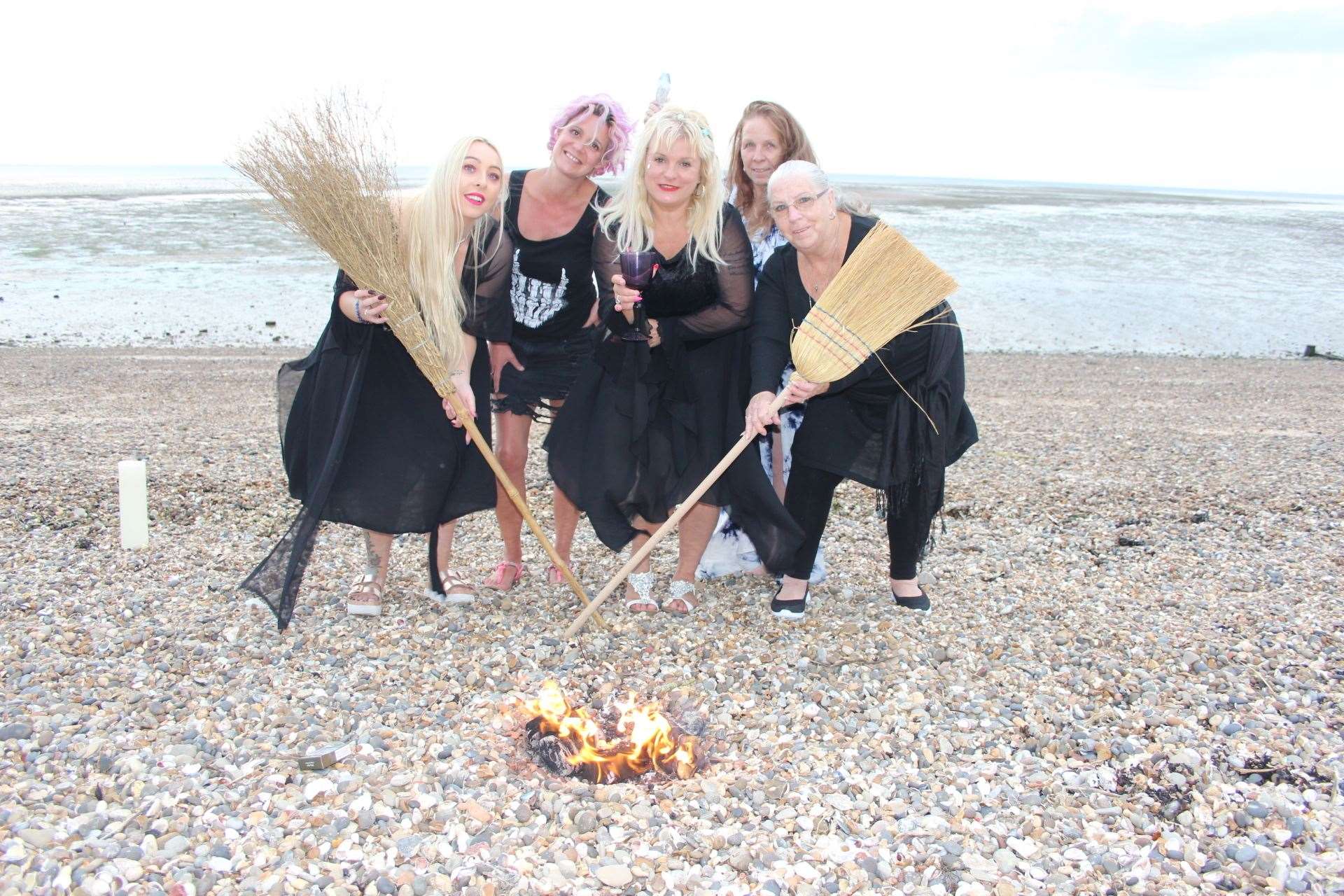 Sheppey witches on the beach at Minster with their broomsticks (16434552)