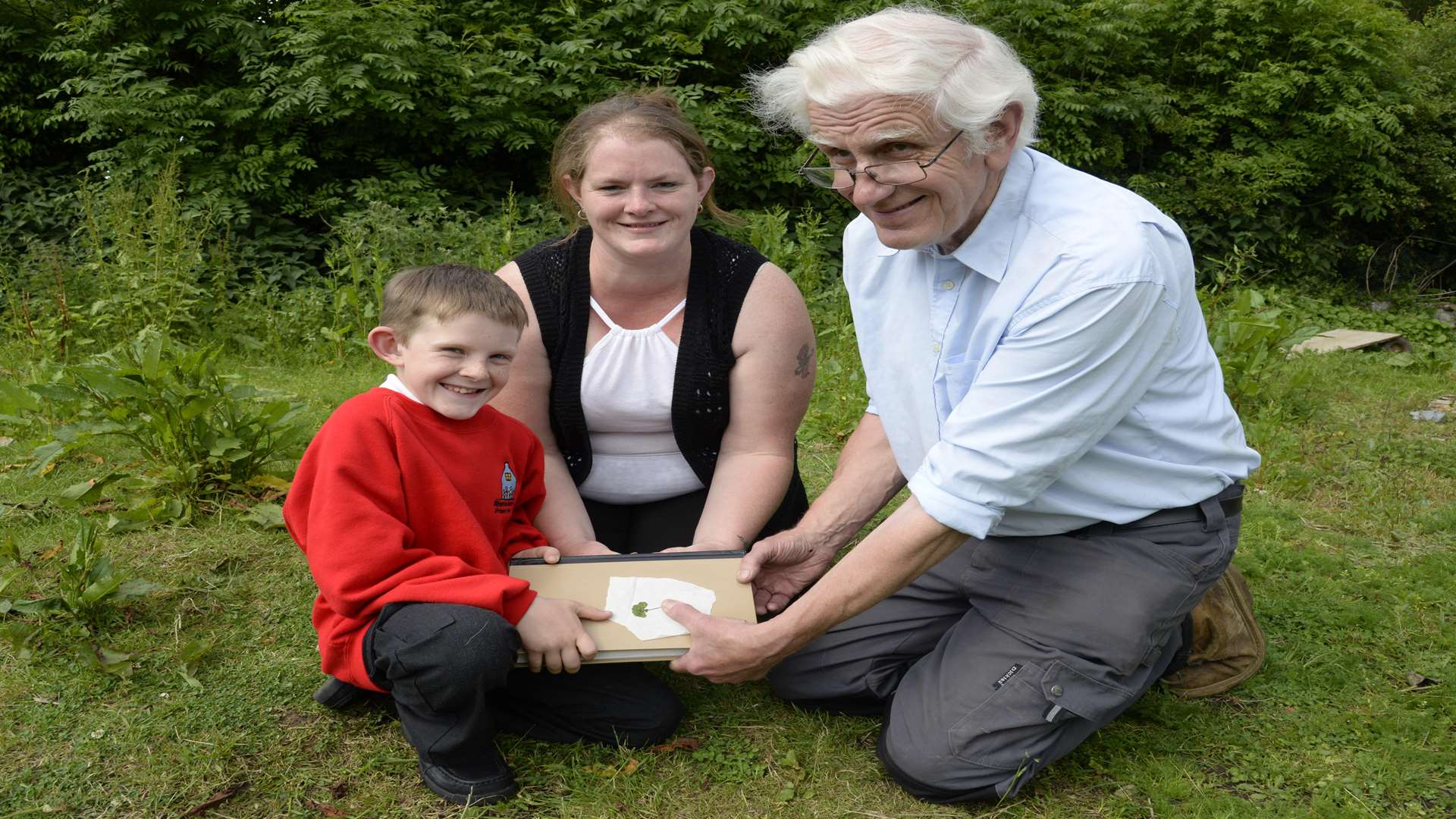 Tom with mum Kate and grandad Jim Waghorn. Picture: Chris Davey