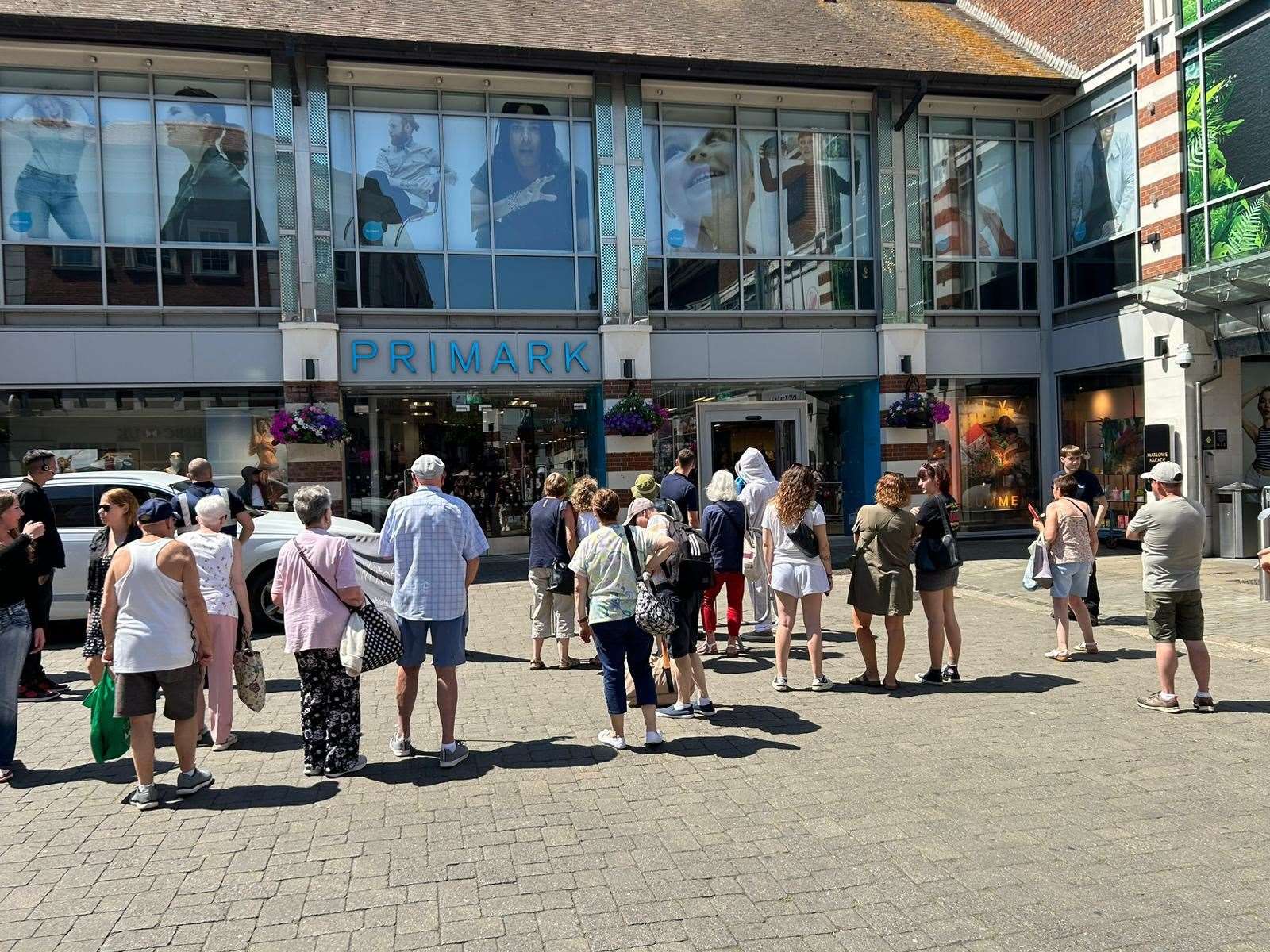 A crowd gathered outside the evacuated Primark store in Canterbury