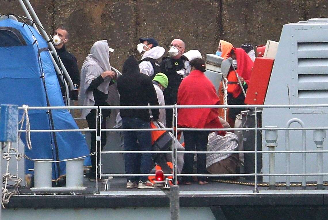 A group of people thought to be migrants are brought into Dover (Gareth Fuller/PA)