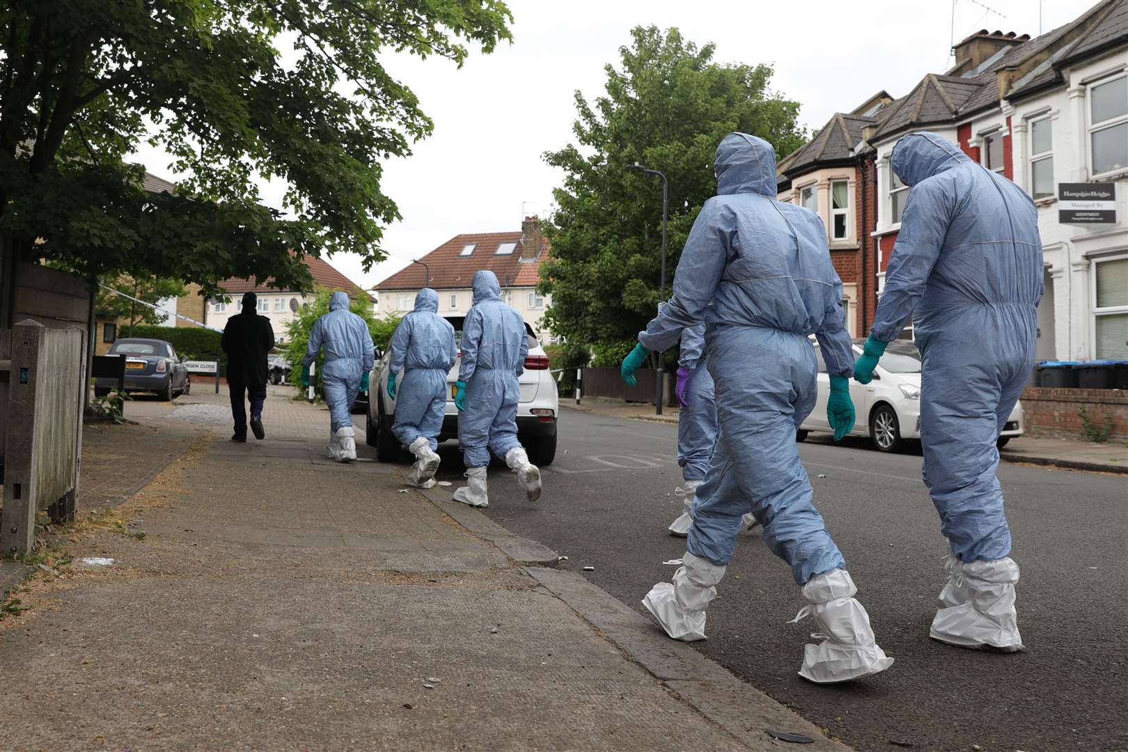 Police forensic officers looking for evidence (Aaron Chown/PA)