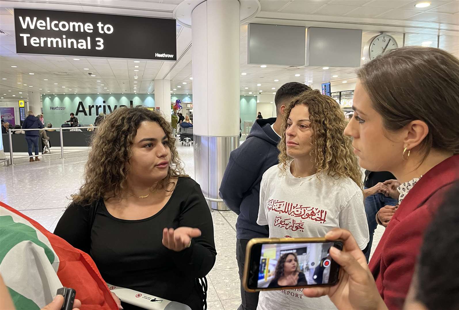 Lara (no surname given) speaks to media at Heathrow Airport after arriving on a flight from Beirut, Lebanon (Andrew Matthews/PA)