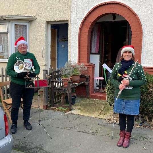 Stuart James and Judtih Wenban peforming to neighbours in Seymour Road, Northfleet