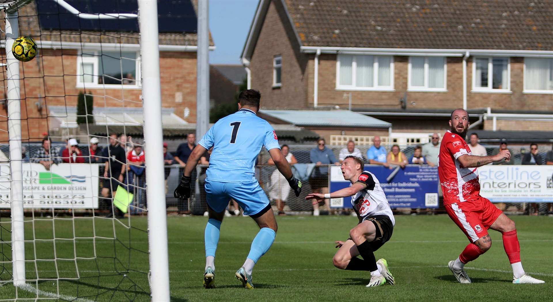 Deal's Ben Chapman gets between Ramsgate goalkeeper Tom Hadler and defender Joe Ellul to score the opening goal. Picture: Paul Willmott