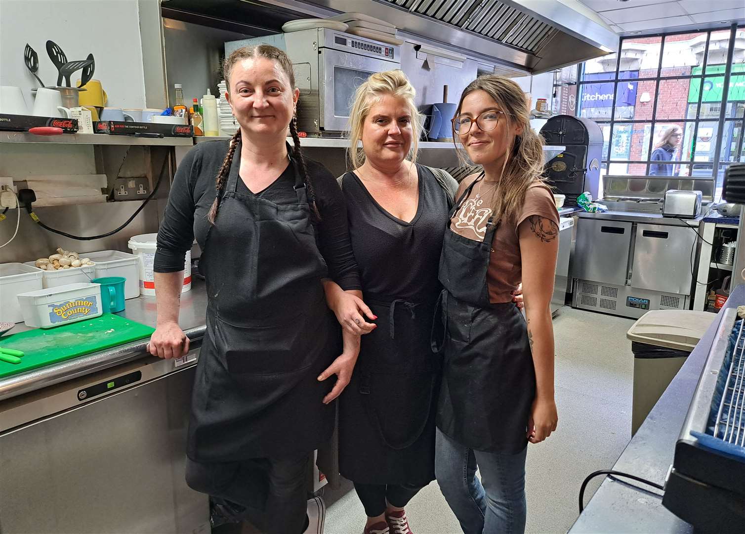 Munch House owner Alexia Noel, centre, with her staff Tatjana Sevciuk, left, and Rosie Ashcroft