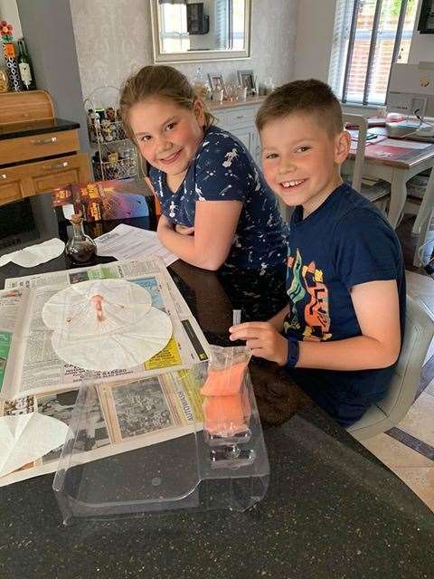Maria Renham from Canterbury sent us this picture of Cayman (aged nine) who used his tools and wood to make a plant stand for his sister Cleo who is growing flowers and herbs . Then they learnt about volcanoes