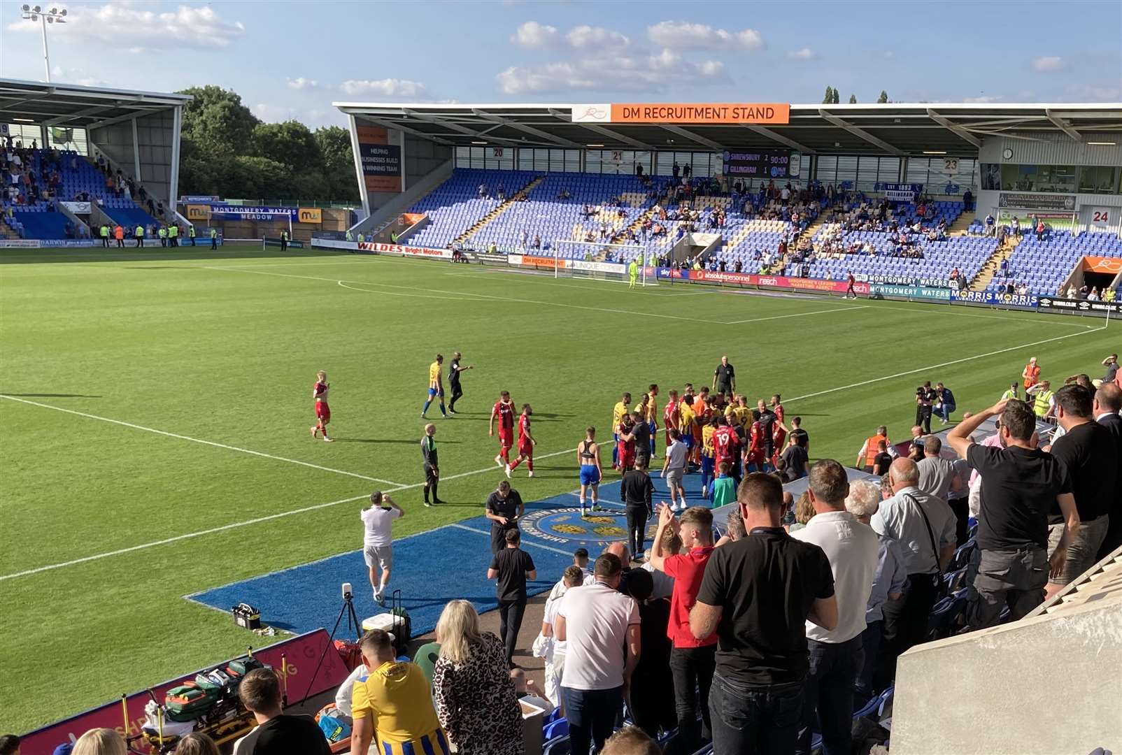Gillingham's game at Shrewsbury ends with a scuffle between players and staff