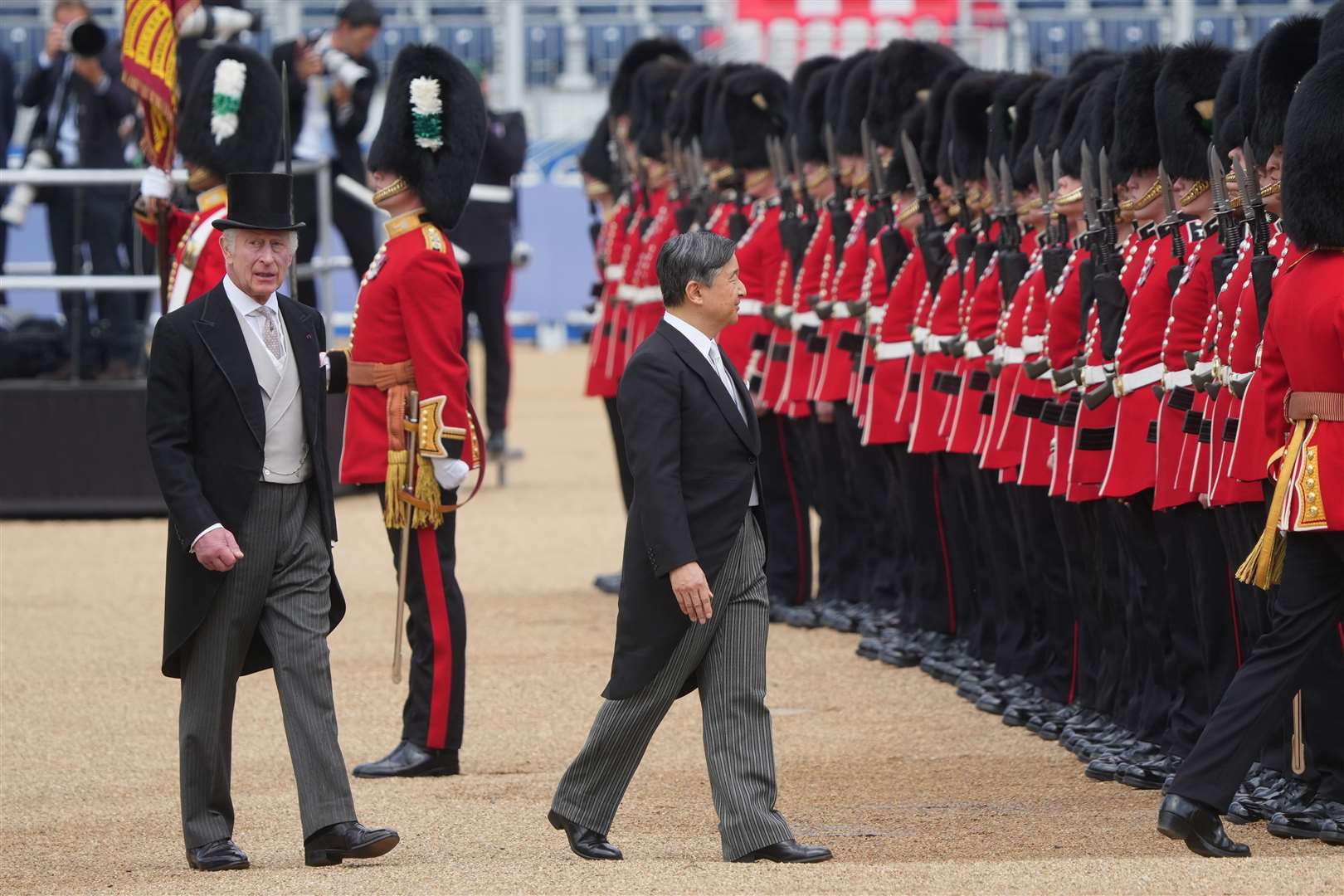 The King follows behind as Emperor Naruhito inspects the guard (Jeff Moore/PA)