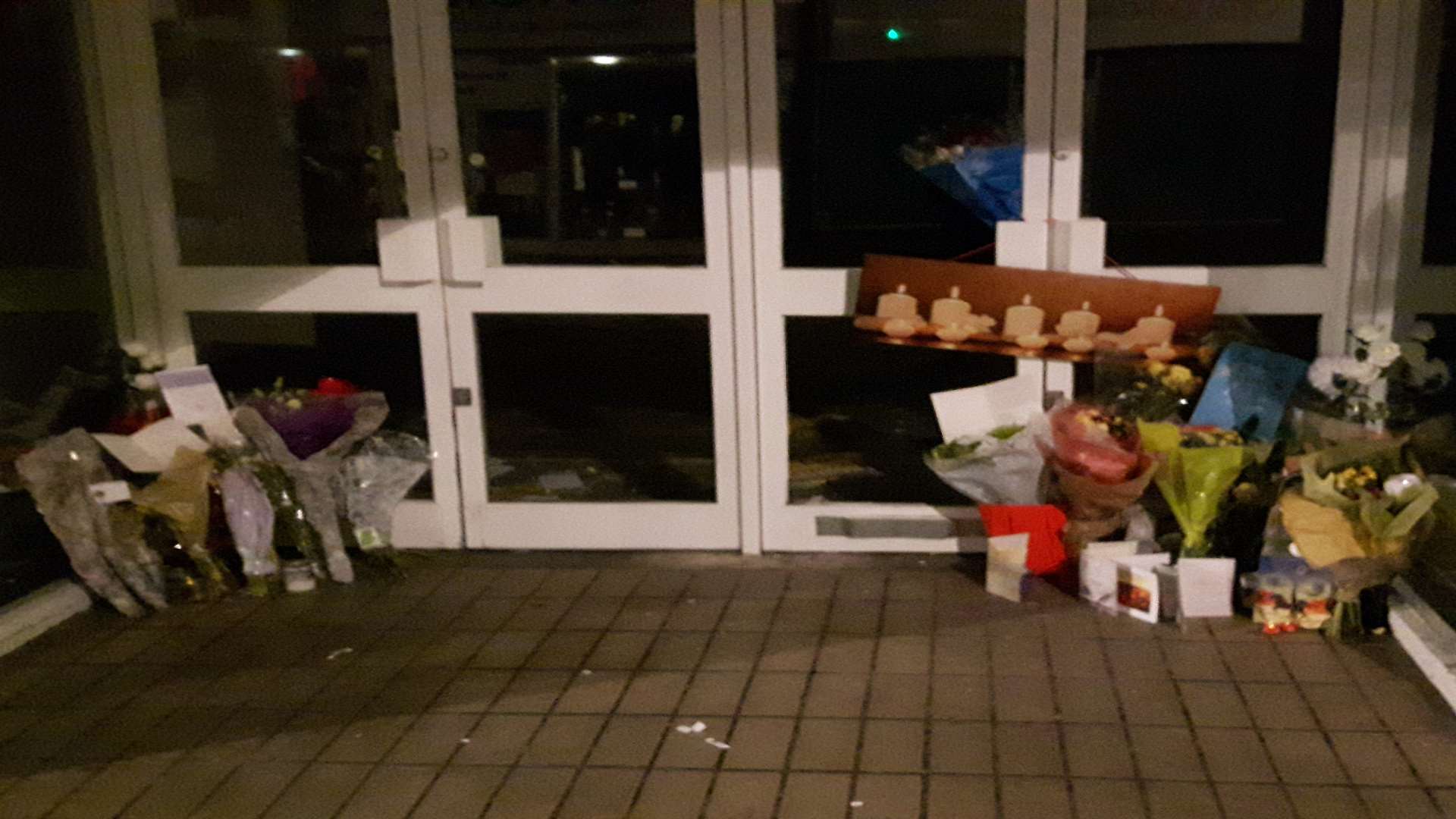 Floral tributes for Michael McCluskey, who was found dead on Chatham High Street on Christmas Eve
