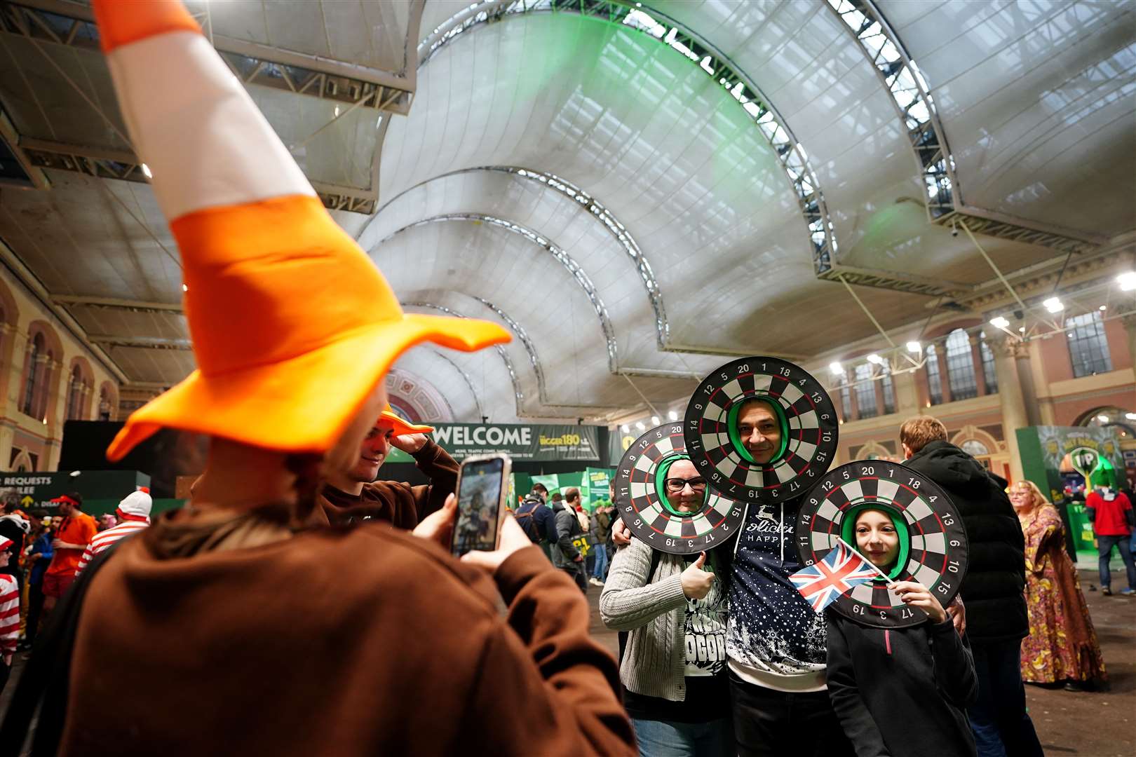 Darts fans also embraced 2025 at Alexandra Palace (Zac Goodwin/PA)