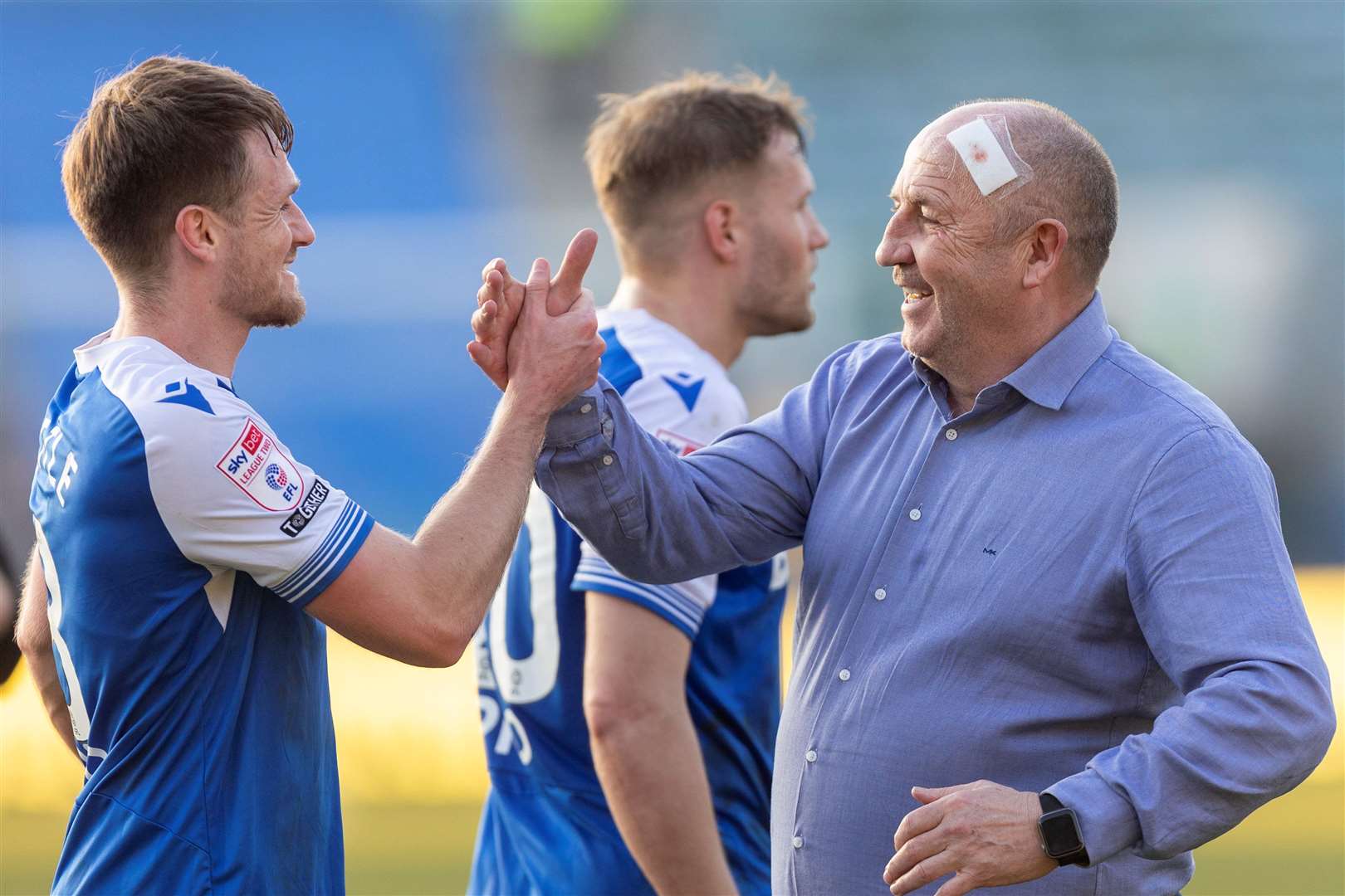 John Coleman congratulates his captain on the win, with a plaster over his injury Picture: @Julian_KPI