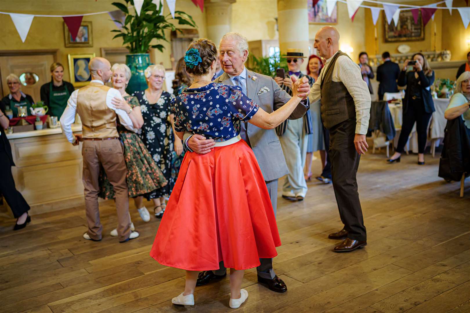 Charles dances with Bridget Tibbs (Ben Birchall/PA)